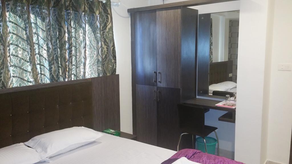 Capital Suites Bangalore Esterno foto